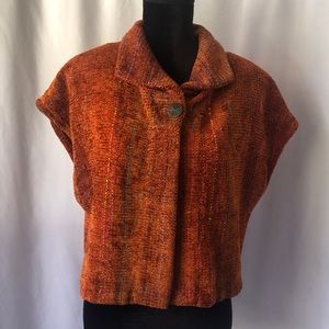Elizabeth jenkis Taos, NM orange vest